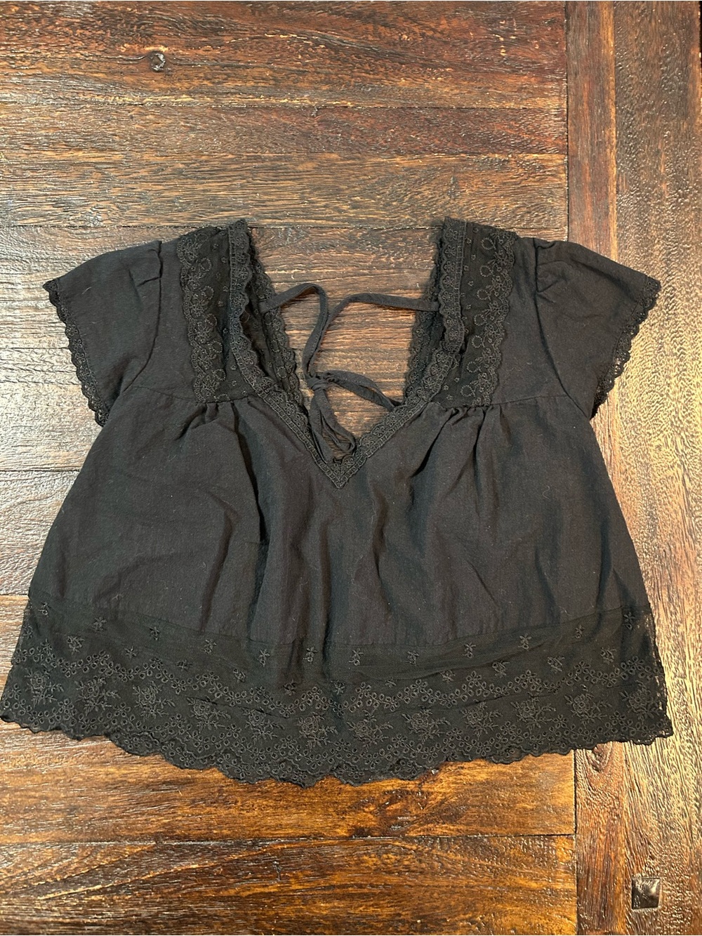 Black Cotton Eyelet Embroidered V-Neck Babydoll Crop Top with Back Tie